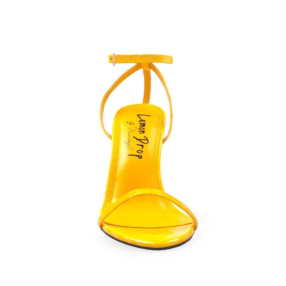 Vegan patent leather women's wedge heel in yellow-front view