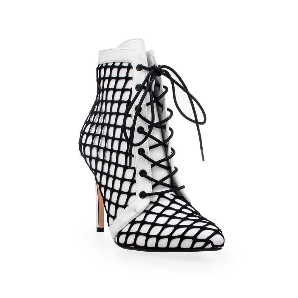 White coloured lace-up and a black netting overlay women's heel-corner view