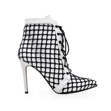 White coloured lace-up and a black netting overlay women's heel-side view