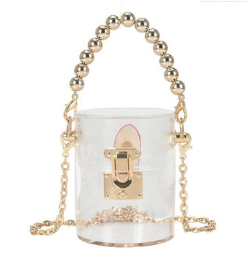 Transparent women bag with golden chain