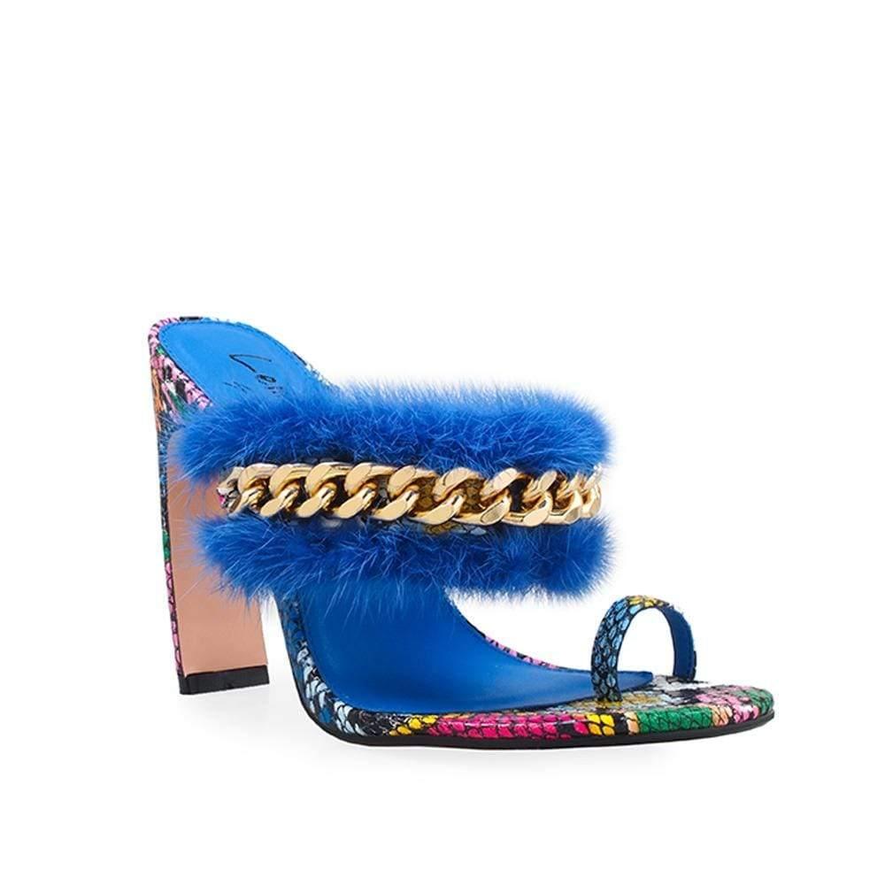 Women heels with upper blue fur and chain - corner view