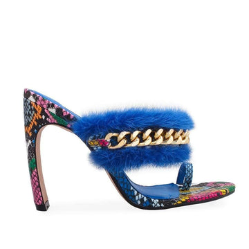 Women heels with upper blue fur and chain - side view