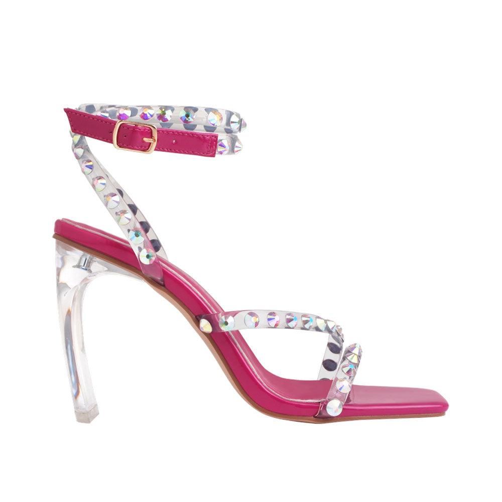 Open-toed heels in fuchsia color with beaded ankle straps and a buckle - side view