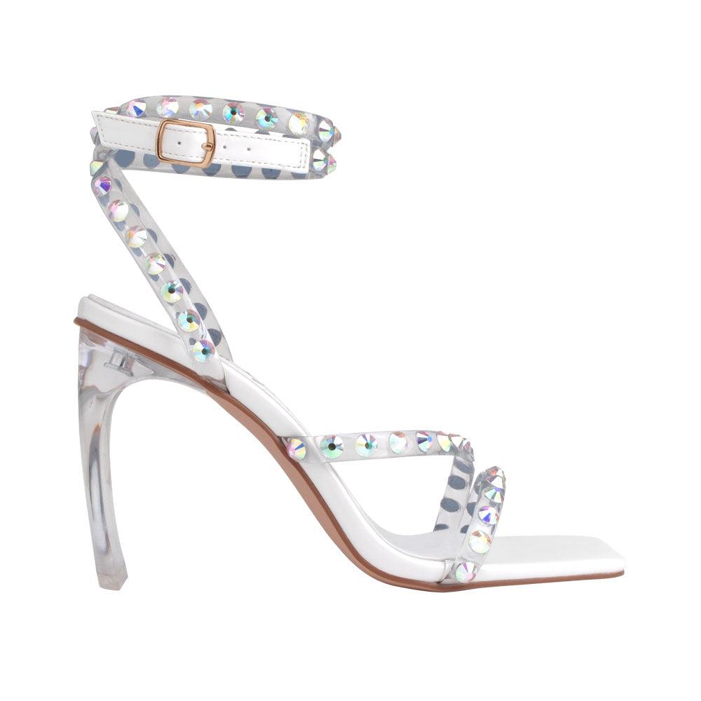 white colored heels with an open toe, beaded ankle straps, and buckle - side view