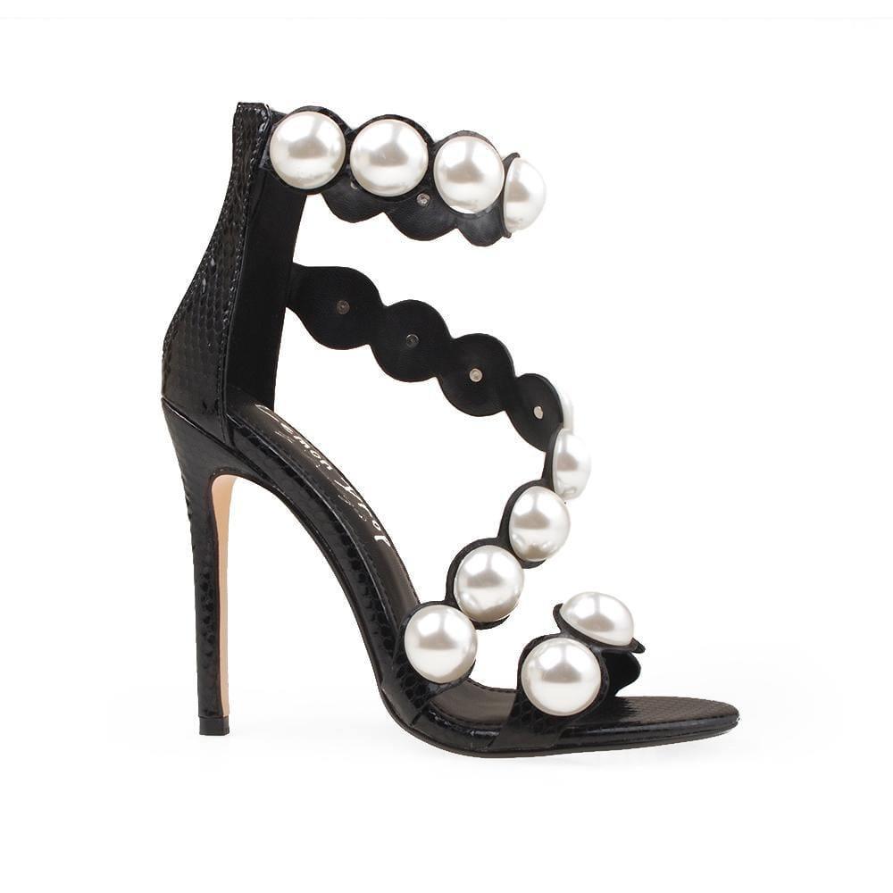 Women's heels in the color black with a silver pearl strap and a back zipper - side view