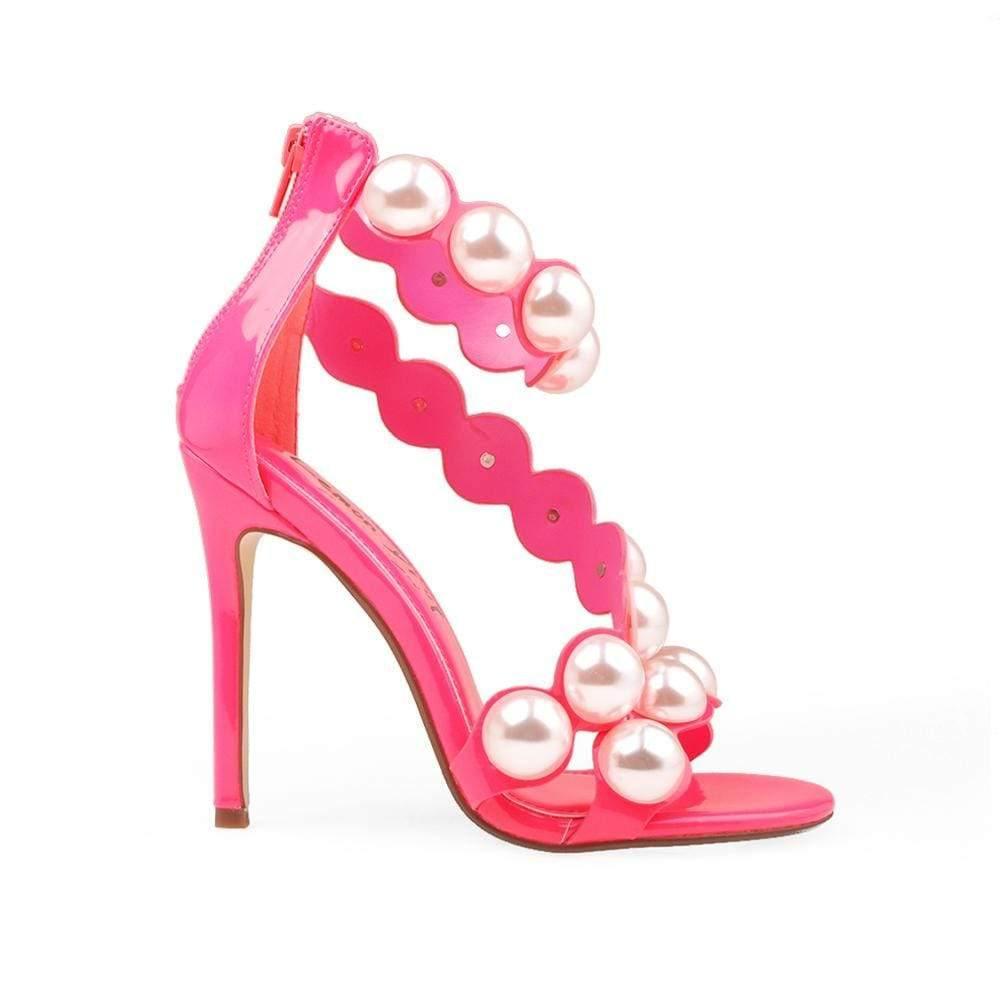 Pink Women Heels with a large pearls design on the strap - side view