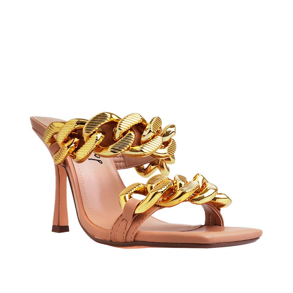 Nude colored women's high heels with a gold dual chained strap-corner view