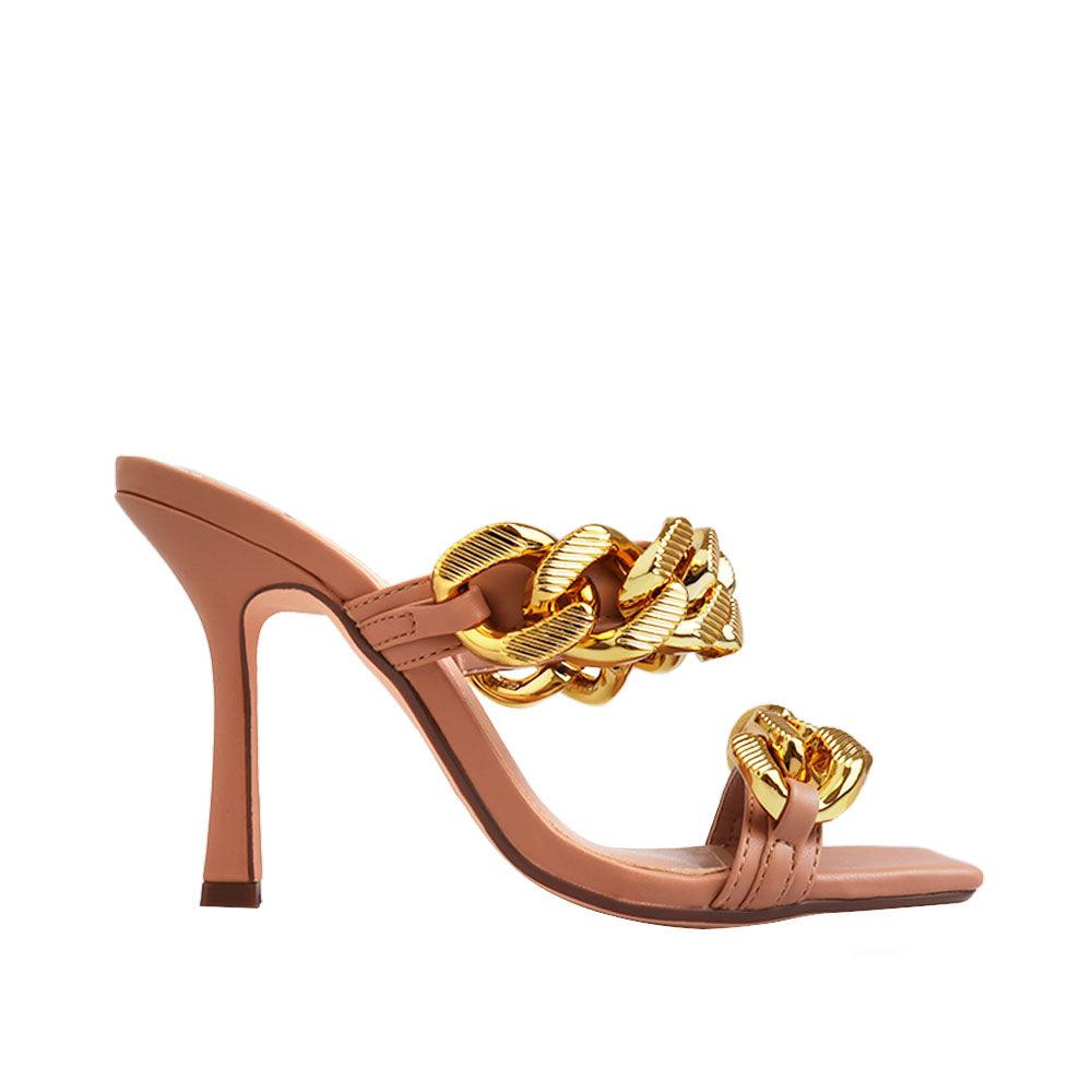 Nude colored women's high heels with a gold dual chained strap-side view