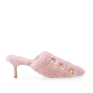 Women's metallic gold stud heels in pink color with a shearling upper-side view