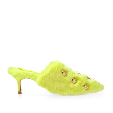 Yellow colored women's metallic gold stud heels with a shearling upper-side view