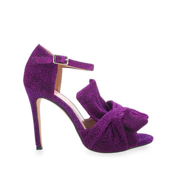 Purple colored women's metallic knit upper high heels with knot design and sandal buckle.