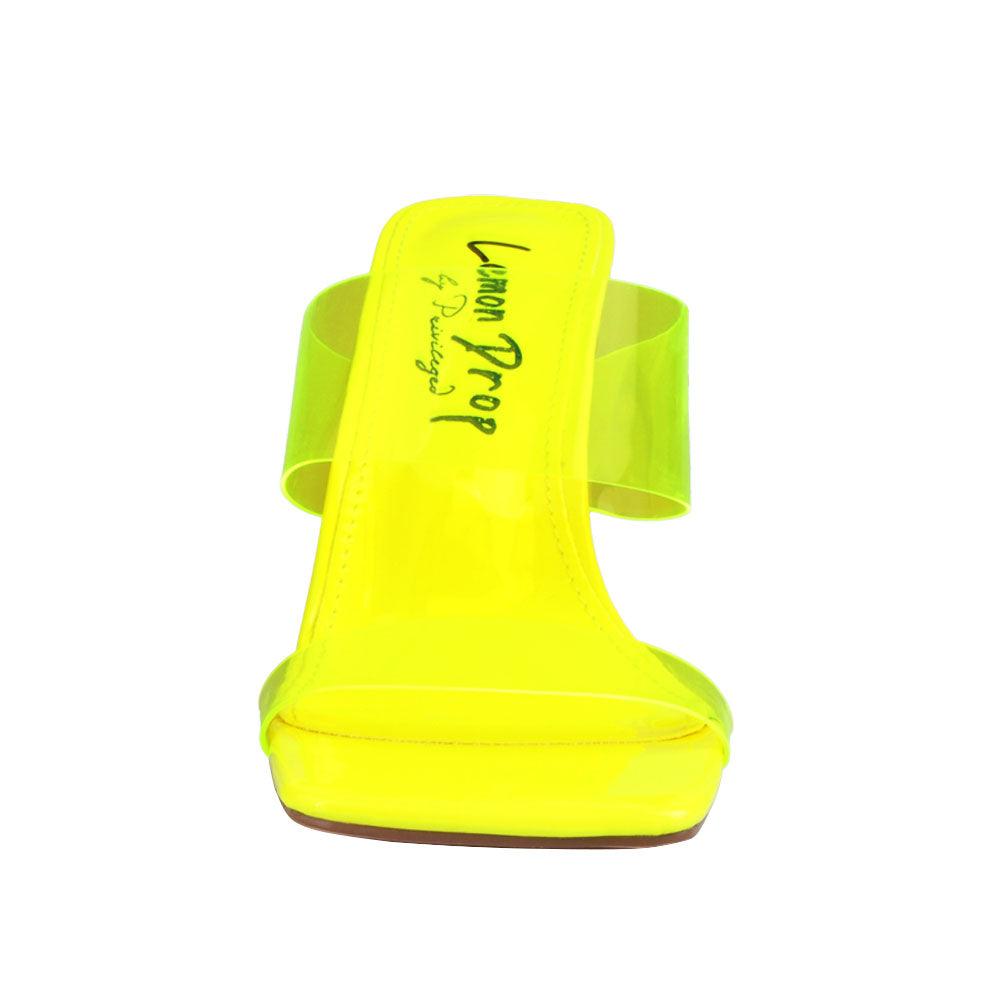 Neon yellow upper with block heels and see through trap-front view