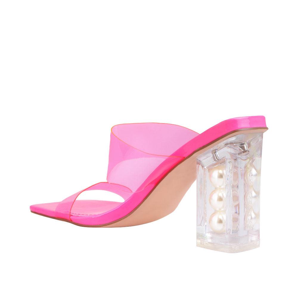 transparent block heels with upper pink and transparent strap-posterior view