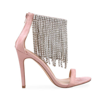 Blush-colored heels for women with silver rhinestone studded tassels and an ankle buckle