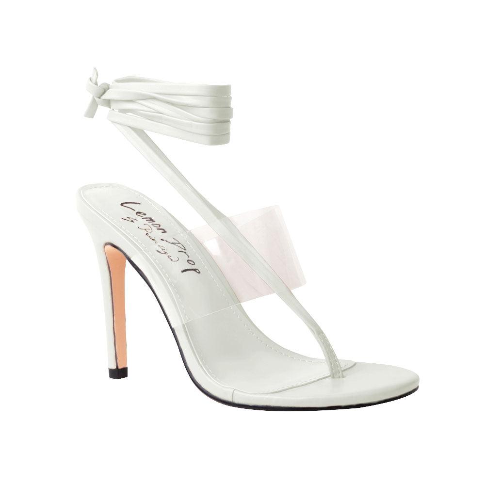 Women's white heels with lace lock up clasp and clear strap-corner view