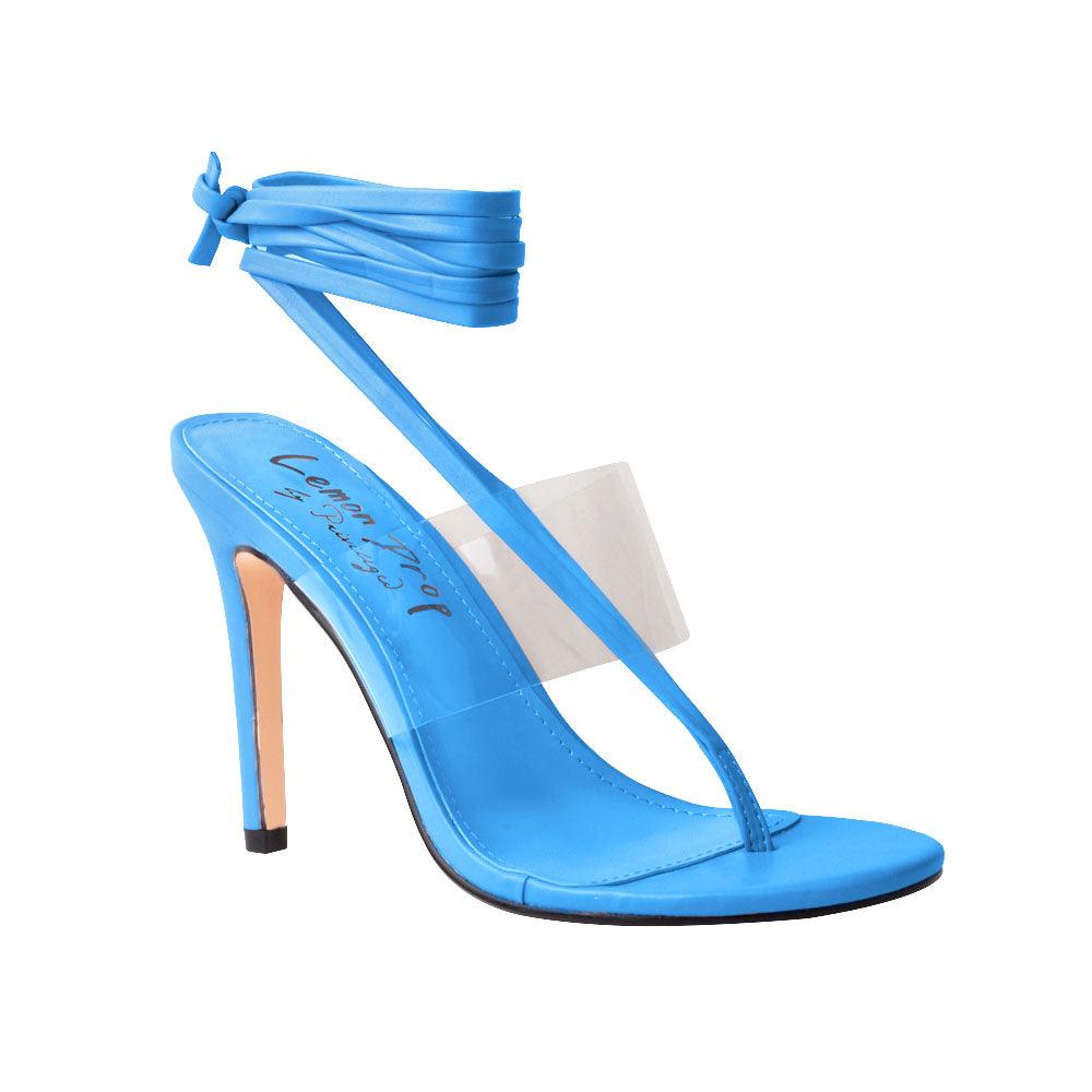 Women's turquoise-colored heels with a transparent strap and lace up clasp-corner view