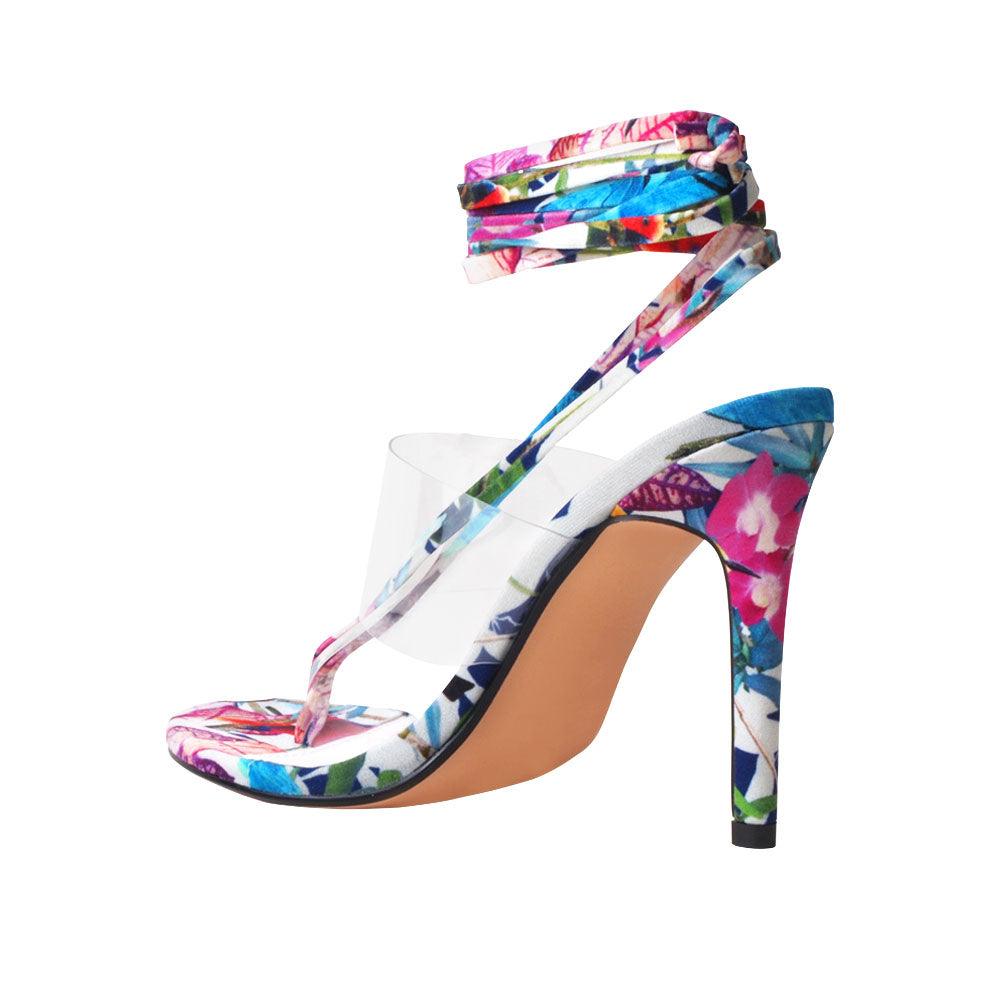 Women's floral multi-colored heels with a transparent strap and lace tie-up clasp-posterior view