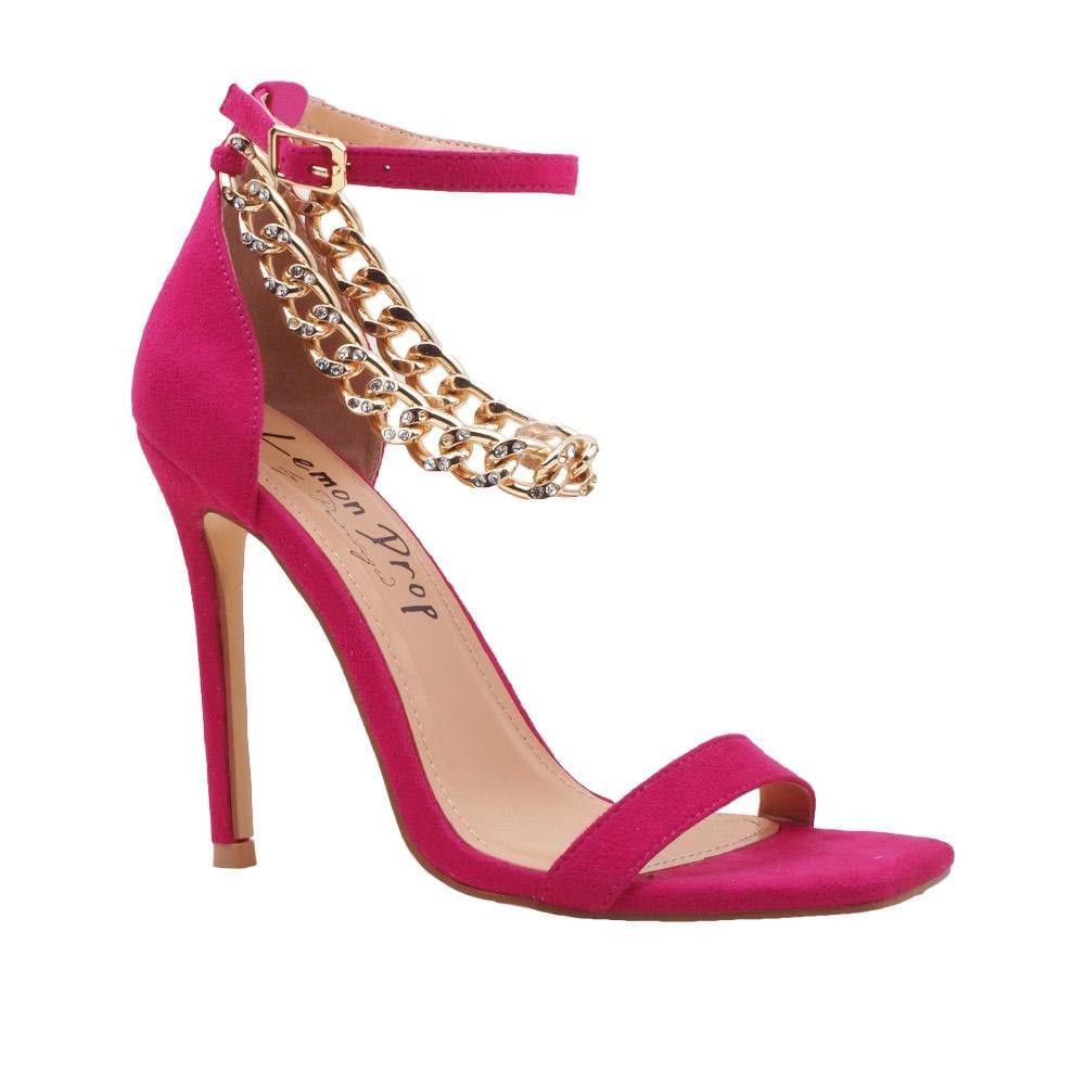 Fuchsia-colored women's high heels with diamond embellished gold chain and ankle buckle fastening-corner view