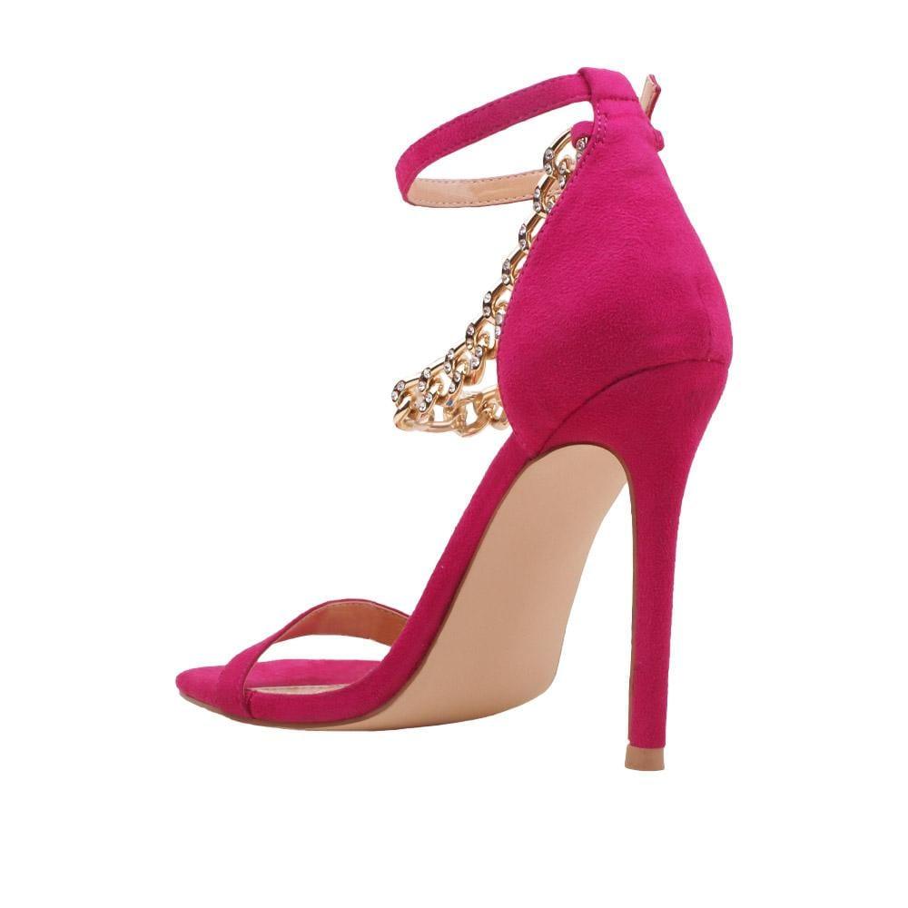 Fuchsia-colored women's high heels with diamond embellished gold chain and ankle buckle fastening-posterior view