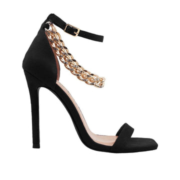 Women's black-colored high heels with a diamond-encrusted gold chain and ankle buckle closure-side view