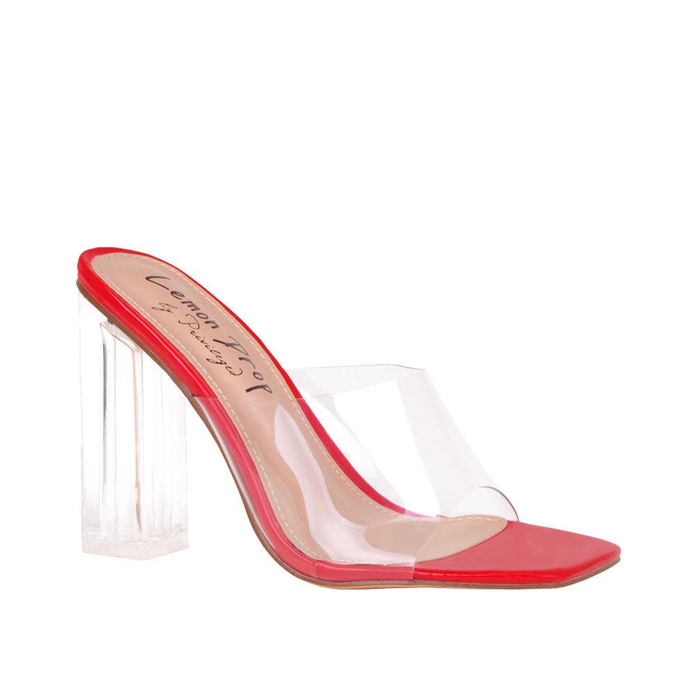 Women's red-colored shoes with transparent block heels and strap-corner view