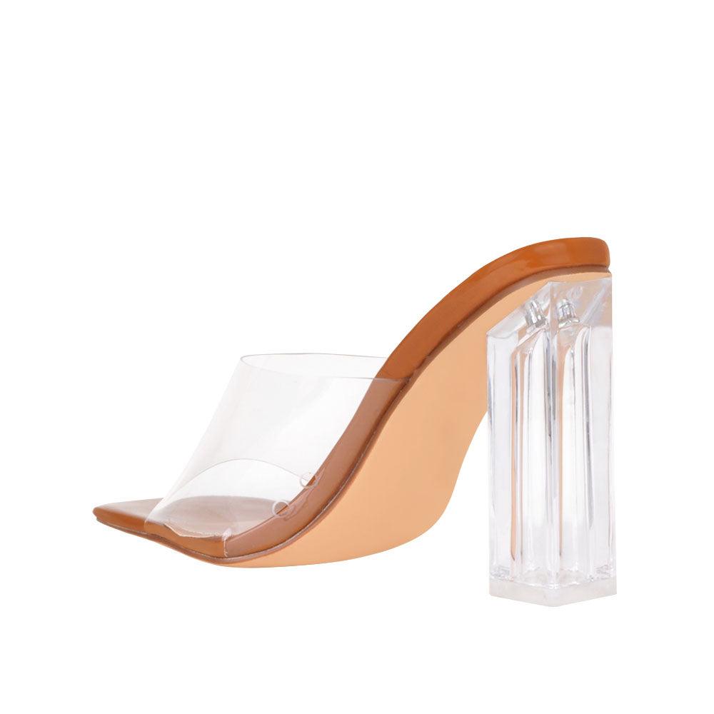 Women's tan-colored shoes with a transparent strap and block heels-posterior view