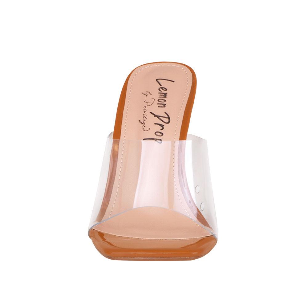 Women's tan-colored shoes with a transparent strap and block heels-front view