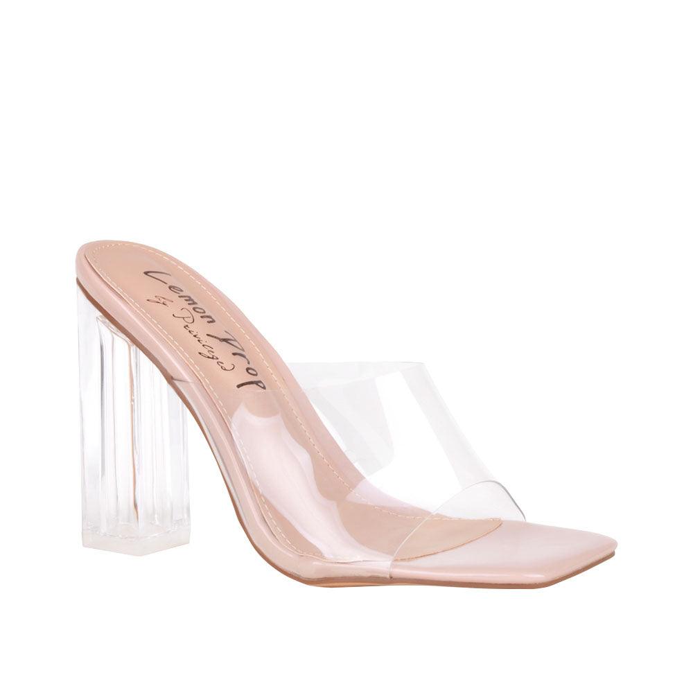 nude-colored women's shoes with transparent block heels and strap-corner view