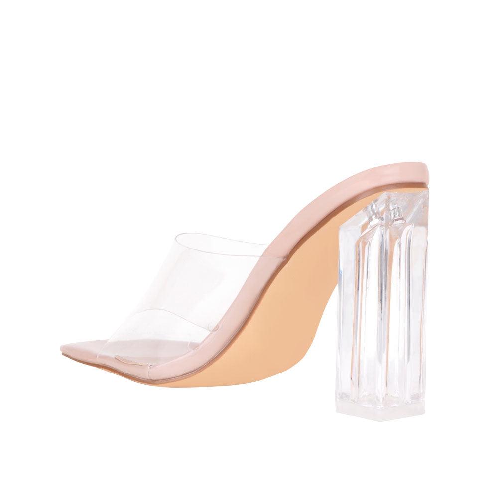 nude-colored women's shoes with transparent block heels and strap-posterior view