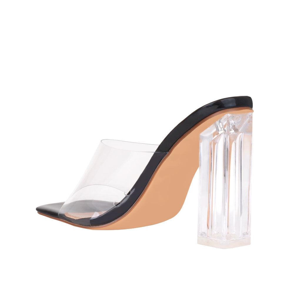 Women's shoes in black-color with transparent block heels and a strap-posterior view