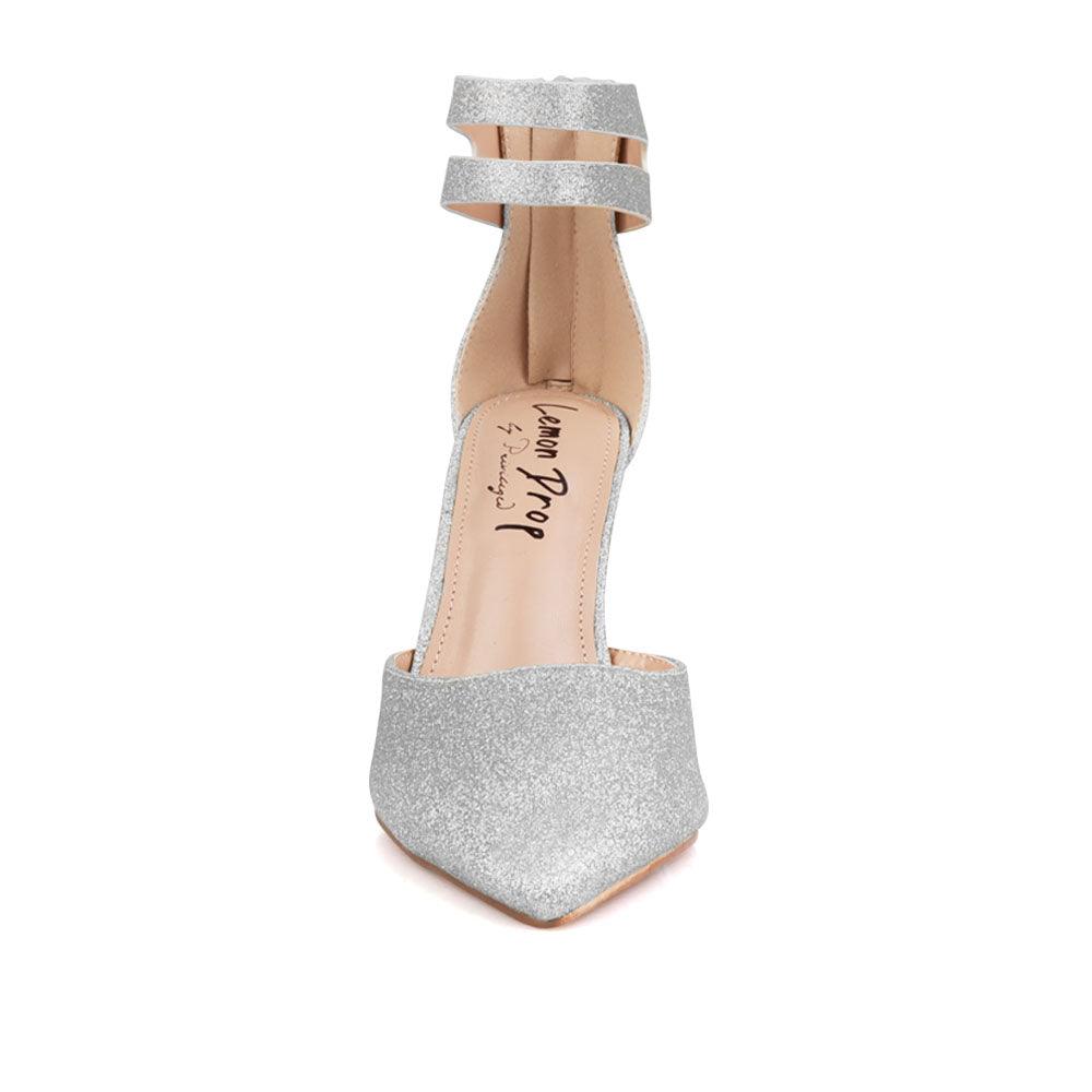 Women's shining silver ankle strap shoes with a closed toe and a back zipper-front view