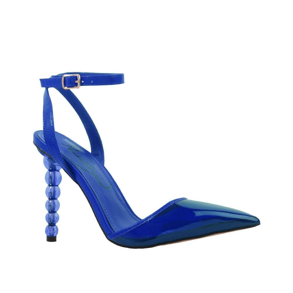 Women's cobalt shoes with a closed-toe semi-transparent vinyl top and ankle buckle closure-corner view