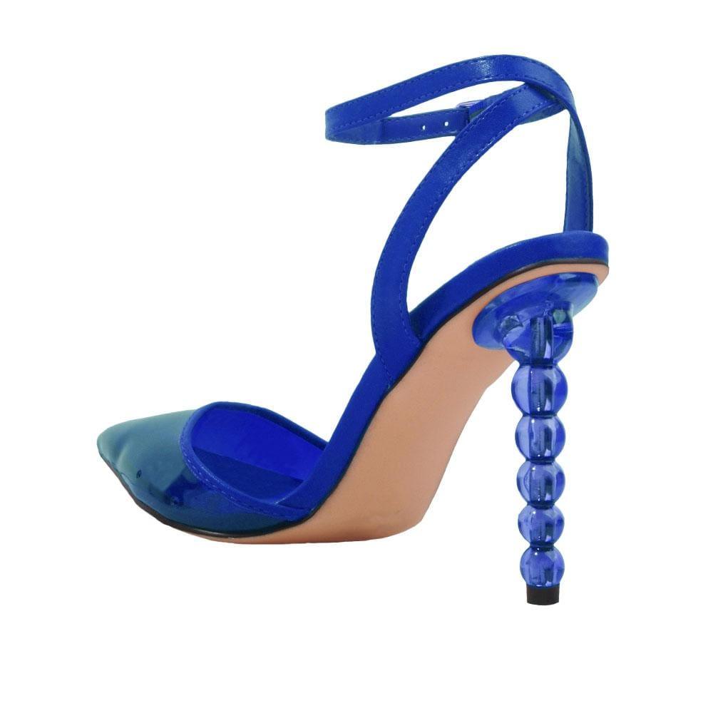 Women's cobalt shoes with a closed-toe semi-transparent vinyl top and ankle buckle closure-posterior view