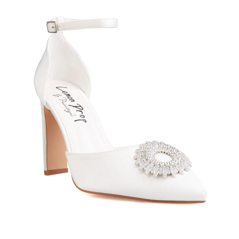 Women's white-colored heel with ankle buckle clasp and closed toe shinning silver design top-corner view