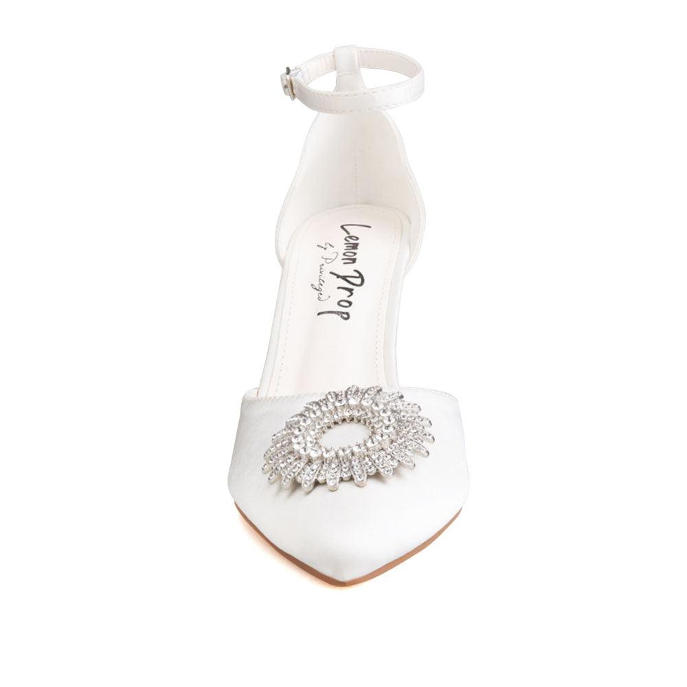 Women's white-colored heel with ankle buckle clasp and closed toe shinning silver design top-front view