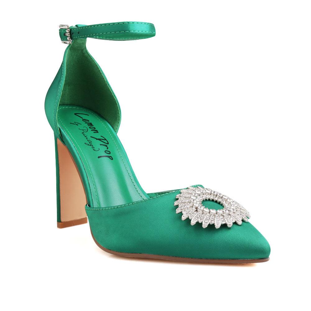 Green-colored women's heel with closed toe design upper and ankle buckle fastening-corner view