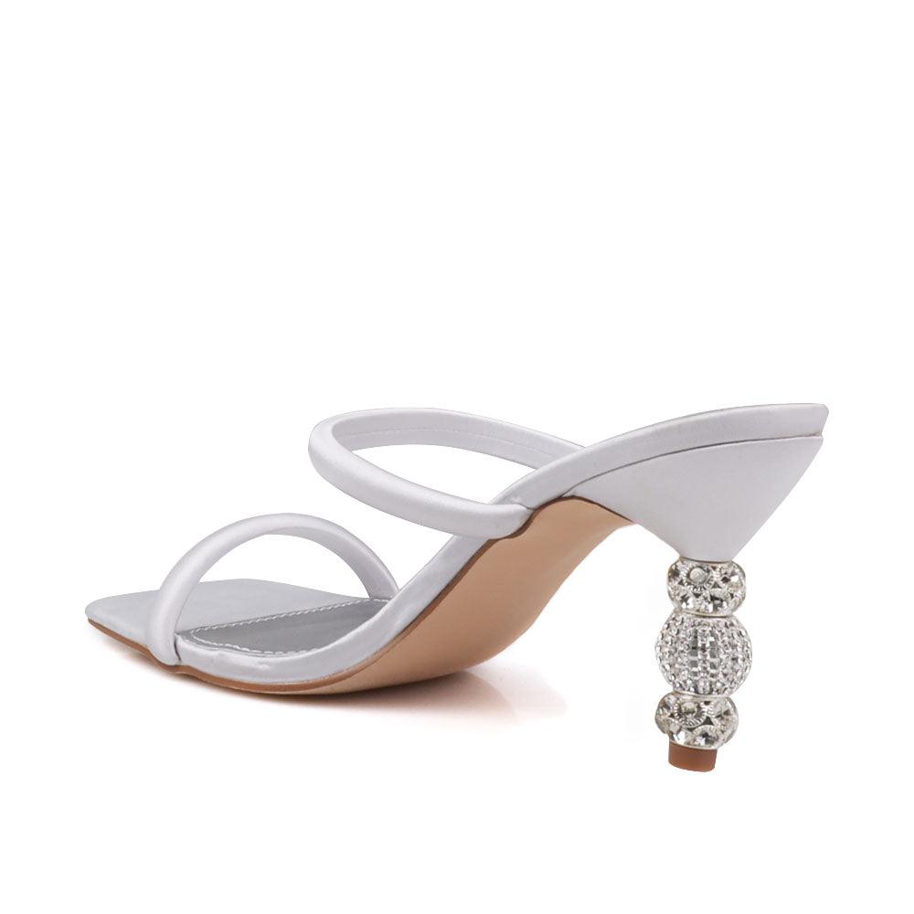 Women's open-toed silver-colored heels with a double strap and a slip on style-posterior view