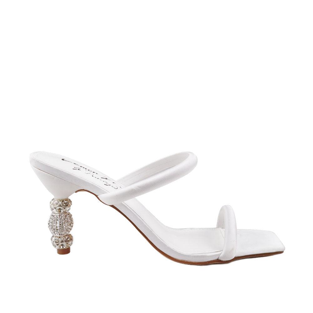 White-colored open toed women's heels with double strap and slip on style-side view