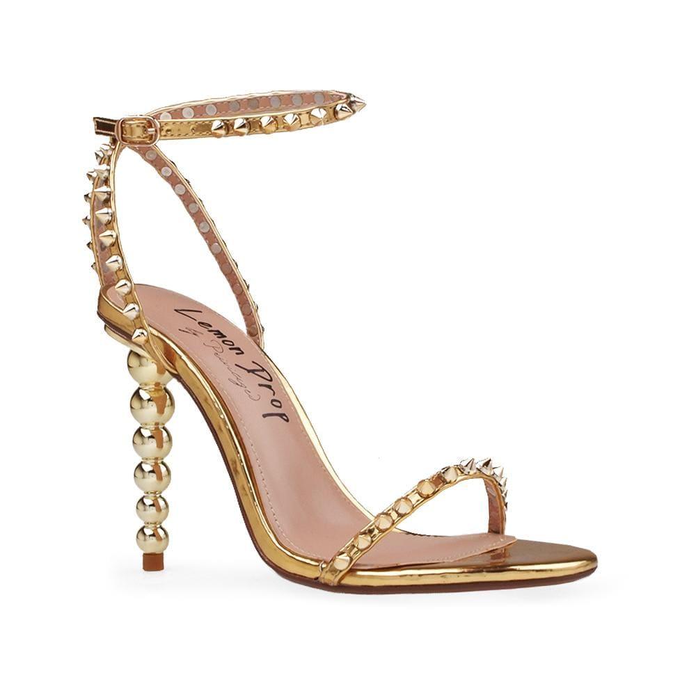 Open-toed pearled shoes for women in gold with a metallic studded ankle buckle clasp-corner view