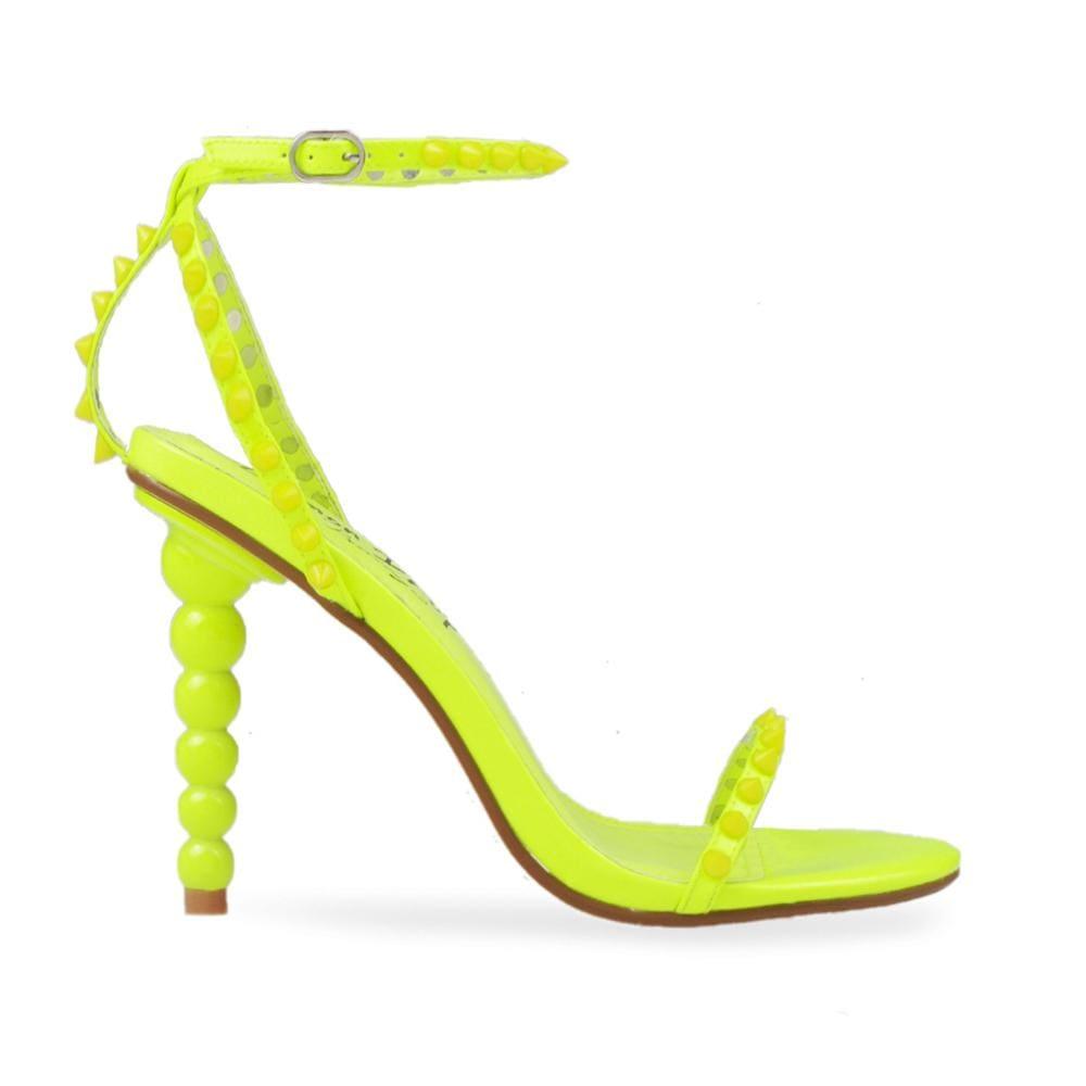 Women's neon yellow open-toed pearled shoes with a metallic studded ankle buckle clasp-side view