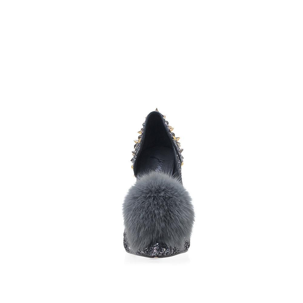 Women's pointed gray-colored fur pom heels with silver spike stud accents and slip on design-front view