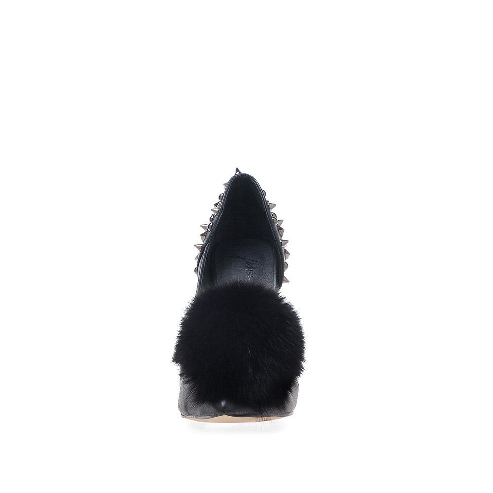 Women's pointed black-colored fur pom heels with silver spike stud details and slip on style-front view