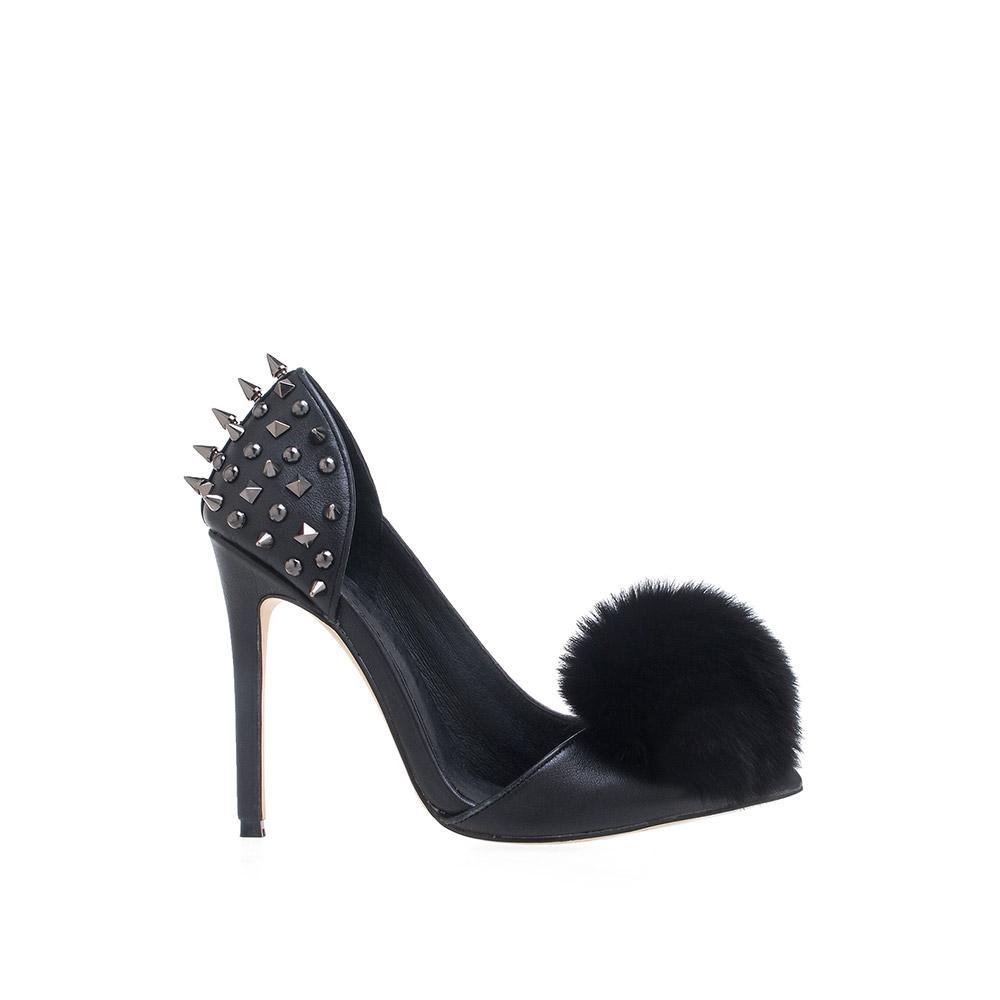 Women's pointed black-colored fur pom heels with silver spike stud details and slip on style-side view