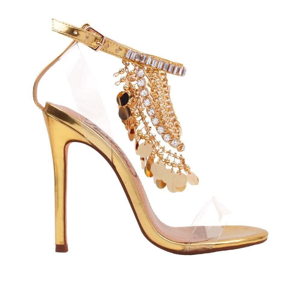 Golden-colored heel with clear strap gold chains, rhinestones, metallic gold charms upper, and ankle buckle fastening for women-side view