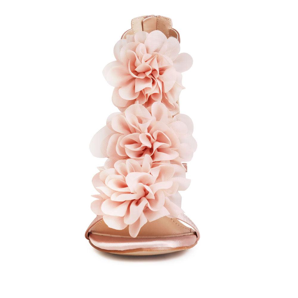 Women's nude-colored shoes with satin floral strapped top and back zipper closure-front view