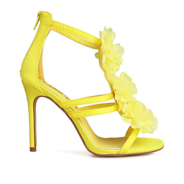 Yellow-colored women's heels with satin opulent floral strapped upper and back zipper closure-side view
