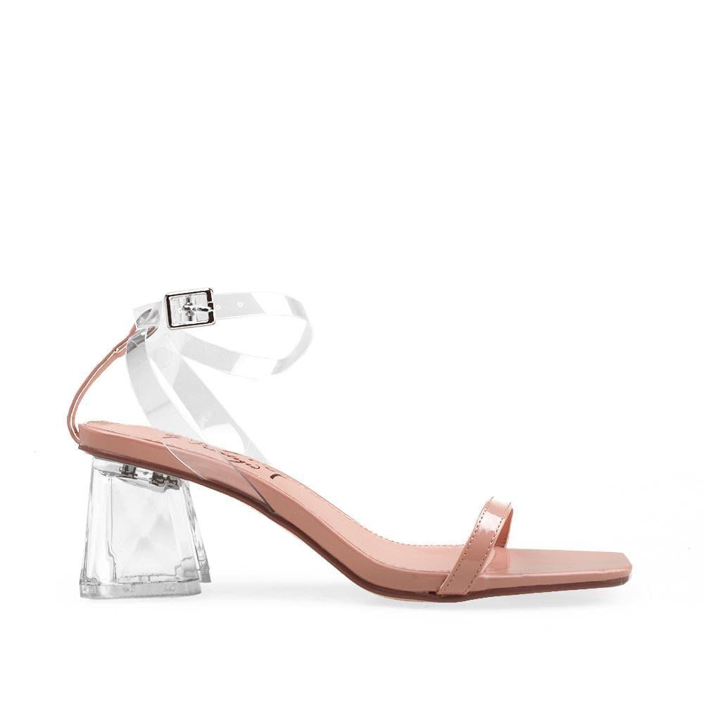 Ladies' nude-colored translucent block heels with clear ankle buckle clasp