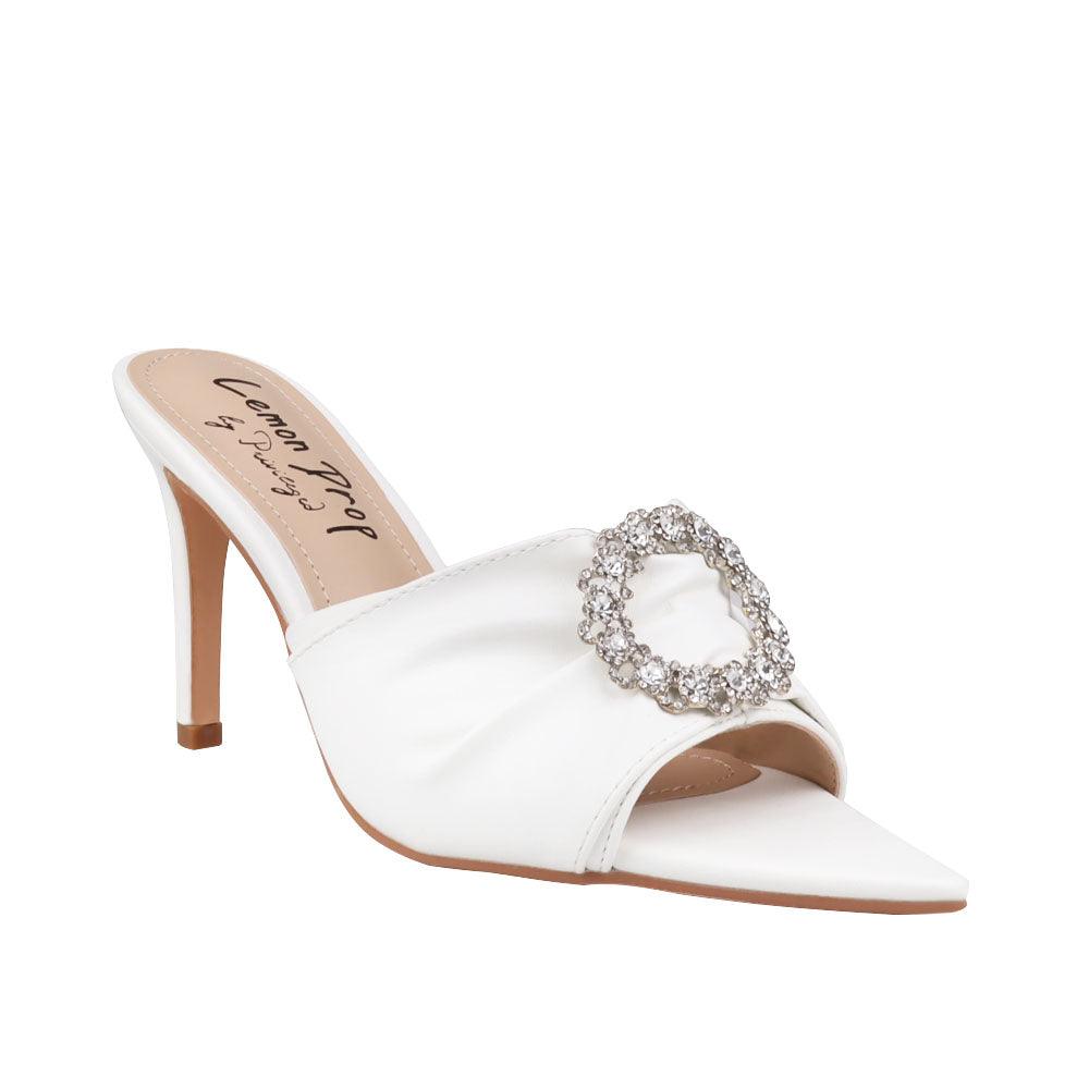 Women's white-colored brooch-encrusted slip-on shoes with an open toe-corner view