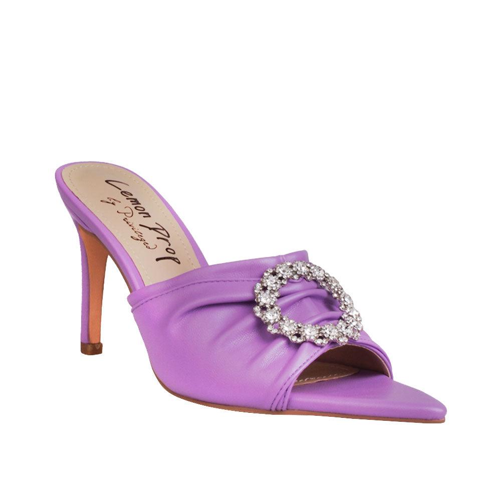 Women's lilac-colored brooch-adorned slip-on shoes with an open toe-corner view