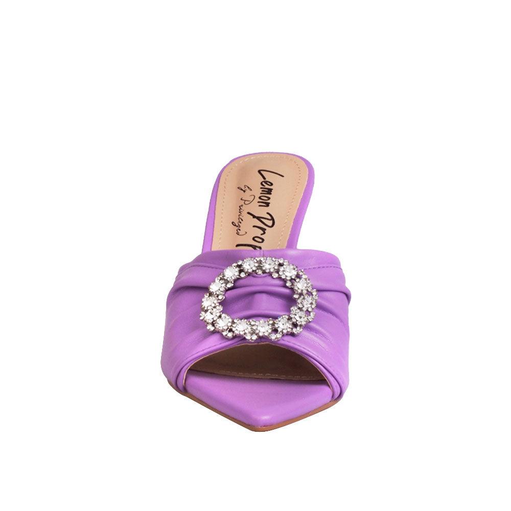 Women's lilac-colored brooch-adorned slip-on shoes with an open toe-front view